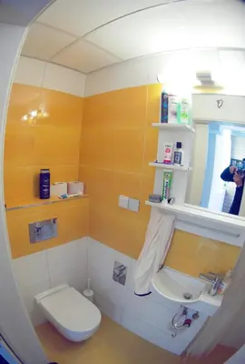 a bathroom with a toilet and a sink at Sunshine Sofia in Sofia