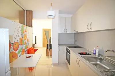 a kitchen with a sink and a counter top at Lilly Apartments in Plovdiv