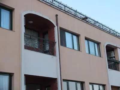 an external view of a building with a balcony at Ma-Bebe SPA Suite - Thermal Jacuzzi and Family Comfort in Pchelin