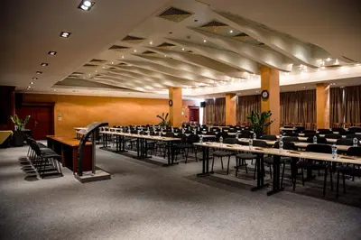 a large banquet hall with tables and chairs at Park Hotel Sankt Peterburg in Plovdiv