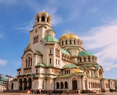 a large building with domes on top of it at Silver & Gold Apartment in Sofia