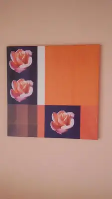 a painting of three roses on a wall at Guest Rooms Filipopol in Plovdiv