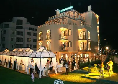 a group of people standing in front of a building at Park Hotel Sandanski in Sandanski