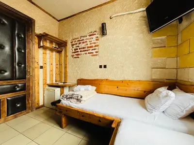 a bedroom with two beds in a room at Rooms43 in Sofia