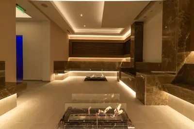 a large bathroom with a tub in the middle of a room at SPA Hotel Ismena in Devin