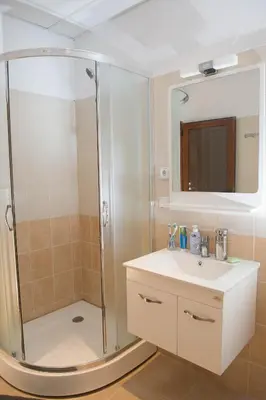 a bathroom with a shower and a sink at Sapareva Kashta in Sapareva Banya