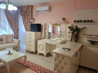 a living room with a vanity and a mirror at Hotel Dalia - Bankya in Bankya