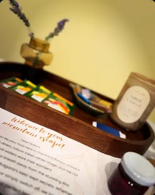 a piece of paper and a sign on a table at Guest House Vergie, Fully Private in Sapareva Banya