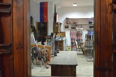 a store filled with lots of different types of skis at Mountain View Resort Studio in Bansko