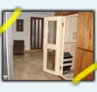 a view of a room with a door and a mirror at Mavrikova Kushta in Bansko