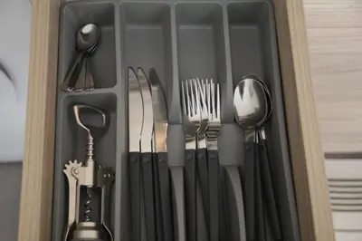 a drawer filled with utensils in a kitchen at Apartment 46 in Sofia