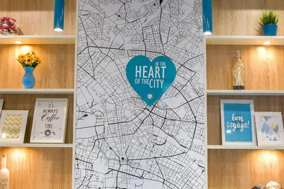 a map of the heart of the city on a wall at City center Apartment in Sofia