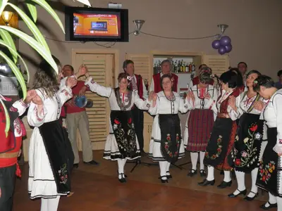 a group of people dancing at a party at Pripetzite Hotel in Godlevo