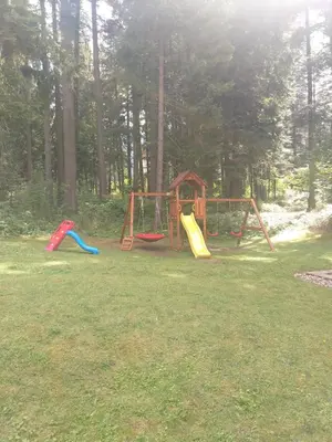 a group of playground equipment in a park at Studio Kris Villa Park in Borovets