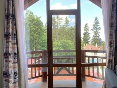 an open door with a view of a balcony at Ice Angels Hotel in Borovets