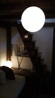 a room with a staircase and a light at Mini Apartment Best Rest in Plovdiv