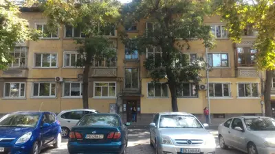 a group of cars parked in front of a building at Mini Apartment Best Rest in Plovdiv