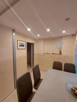 a conference room with a table and chairs at Libera in Sofia