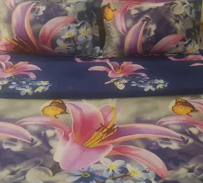two pillows with pink flowers and butterflies on them at Libera in Sofia