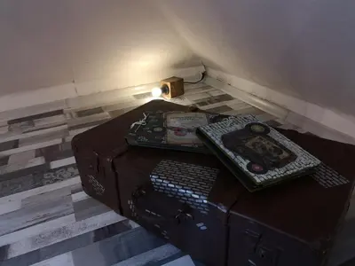 a room with a desk with a keyboard and a telephone at Gramophone Sofia Downtown Apartment in Sofia