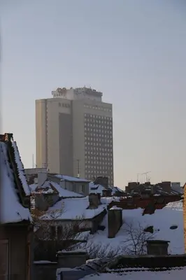 a city with a tall building in the background at Studio 5 Corners in Sofia