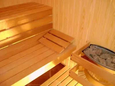 a inside of a sauna with a bowl of rocks at The Secret Garden in Ognyanovo