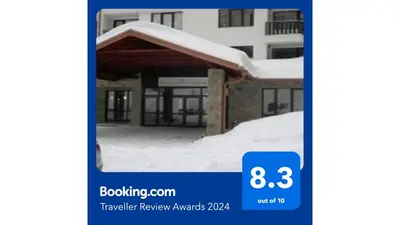a picture of a building with snow on it at Borovest Garden. in Borovets