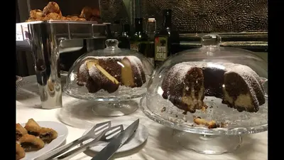 a cake in two glass dishes on a table at Art 'Otel in Sofia