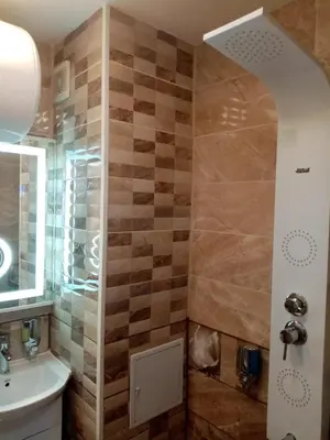 a bathroom with a sink and a shower at Benita Inn apartments in Sofia
