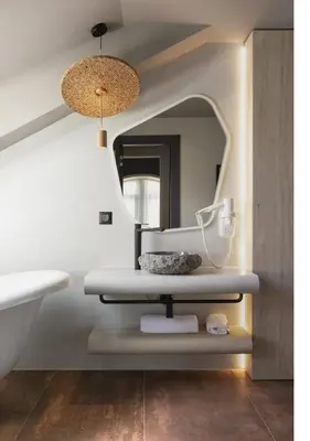 a bathroom with a sink and a mirror at Oborishte 63,The Art Boutique Hotel by Sandglass in Sofia