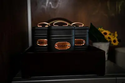 a couple of black jewelry boxes sitting on a table at My Guest Rooms in Plovdiv