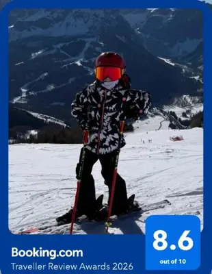 a person on skis in the snow on a mountain at Apart Hotel Dream in Bansko