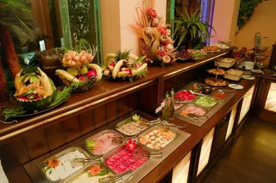 a buffet line with many different types of food at Apart Hotel Flora Residence Daisy in Borovets