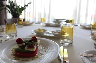 a white plate with a dessert on a table at Casa Boyana Boutique Hotel in Sofia