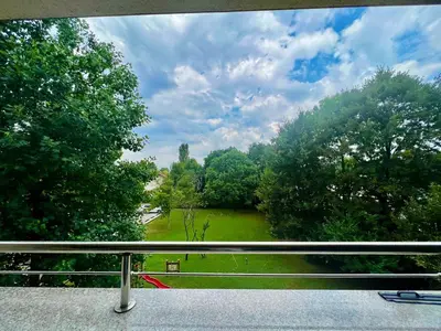 a view of a park from a balcony at Hotel ZOO Sofia in Sofia