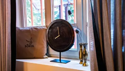 a fan sitting on a window sill next to a window at Villa Sokol in Borovets