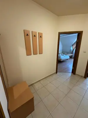 a room with three pictures on the wall at PM Services Royal Plaza Apartments in Borovets