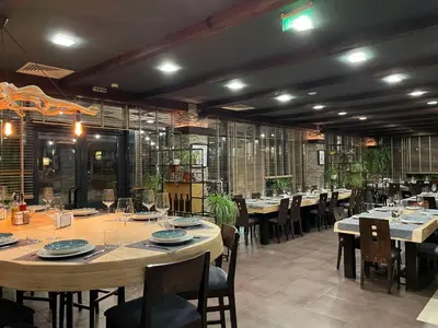 a large dining room with tables and chairs at Local Stay Hotel, BW Signature Collection in Bansko