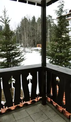 a window with a view of a snow covered yard at Victoria Hotel Borovets - Free Parking in Borovets