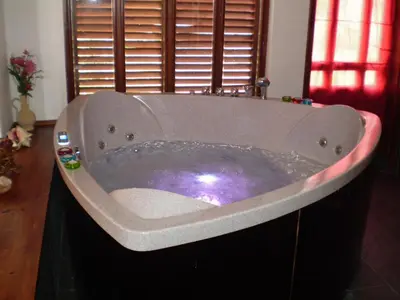 a large bath tub in a bathroom at Villa Filip in Bachevo