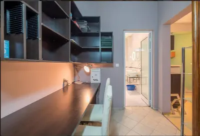a kitchen with a wooden counter top in a room at Han Krum 2 Bedroom Central Flat in Sofia