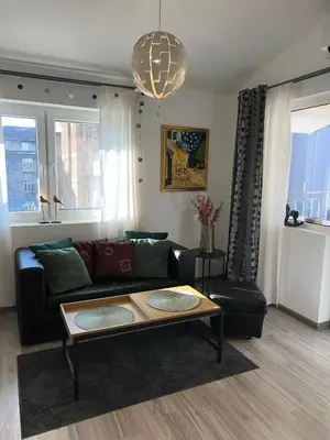 a living room with a couch and a coffee table at The Yellow House in Sofia in Sofia