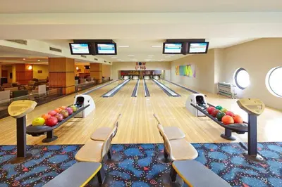 a bowling alley with pins and balls on the lanes at Pravets Resort Apartments in Pravets