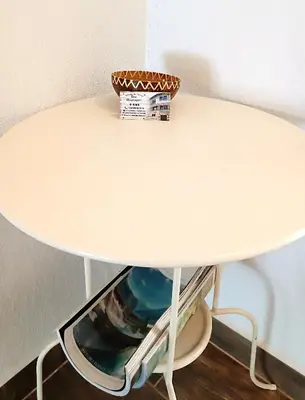 a white table with a basket on top of it at Guesthouse White Margarit in Melnik