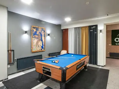 a billiard room with a pool table in it at SPA Hotel Olymp in Velingrad