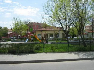 a park with a playground with a slide at Khan Krum House & Apartments for rent in Elin Pelin