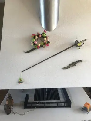 two pictures of objects on a table with a keyboard at Pirin Golf Villa Emila in Bansko