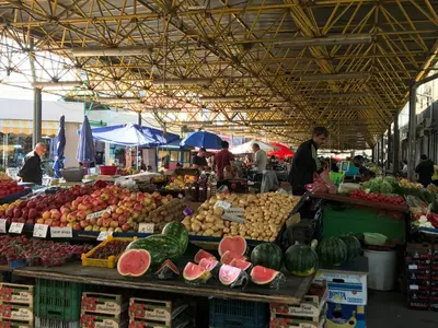 a farmers market with fruits and vegetables on display at Modern Studio 20 Meters from Mladost 1 Metro Station in Sofia