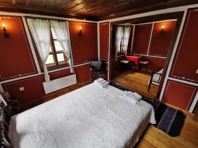 an overhead view of a bedroom with a bed at Hadji Neikovi Guest Houses in Koprivshtitsa