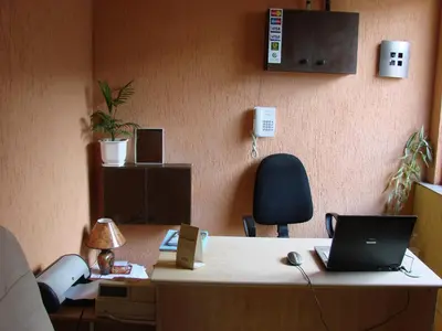 an office with a desk with a laptop computer on it at Avel Guest House in Sofia